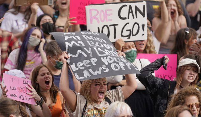 People attend an abortion-rights rally at the Utah State Capitol Thursday, May 5, 2022, in Salt Lake City. (AP Photo/Rick Bowmer)