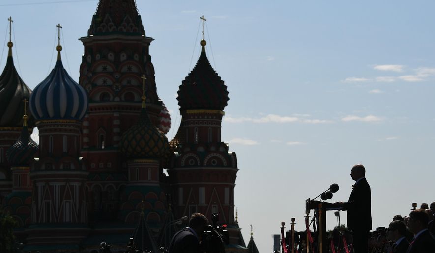 In this file photo, Russian President Vladimir Putin delivers his speech during the Victory Day military parade marking the 75th anniversary of the Nazi defeat in Moscow, Russia, June 24, 2020. (Ramil Sitdikov, Sputnik, Kremlin Pool Photo via AP, File)  **FILE**