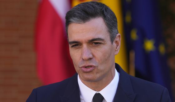 FILE - Spain&#39;s Premier Pedro Sanchez speaks during a joint news conference with Denmark&#39;s Prime Minister Mette Frederiksen at the Moncloa Palace in Madrid, Spain, Monday, Feb. 21, 2022. Spain&#39;s intelligence agency is facing growing criticism after the discovery that politicians had their phones hacked, even as far as the device in the prime minister&#39;s pocket. The head of Spain’s National Intelligence Center is set to appear at a closed-door parliamentary hearing on Thursday, May 5, 2022 and is expected to break the secrecy code that prohibits members of the government from revealing the workings of her agency. (AP Photo/Paul White, File)