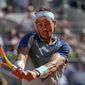 Spain&#39;s Rafael Nadal returns the ball against David Goffin of Belgium during their match at the Mutua Madrid Open tennis tournament in Madrid, Spain, Thursday, May 5, 2022. (AP Photo/Manu Fernandez)