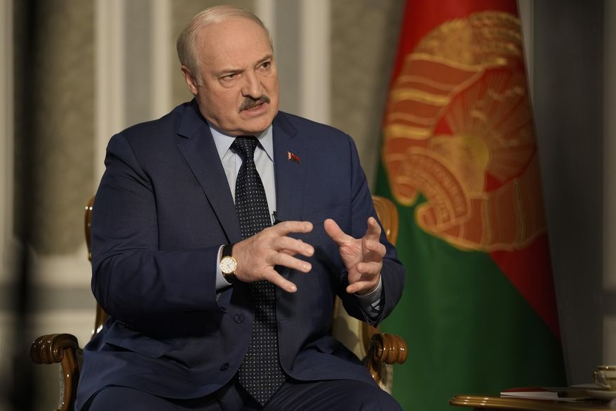 Belarus President Alexander Lukashenko speaks during an interview with The Associated Press at the Independence Palace in Minsk, Belarus, Thursday, May 5, 2022. (AP Photo/Markus Schreiber)