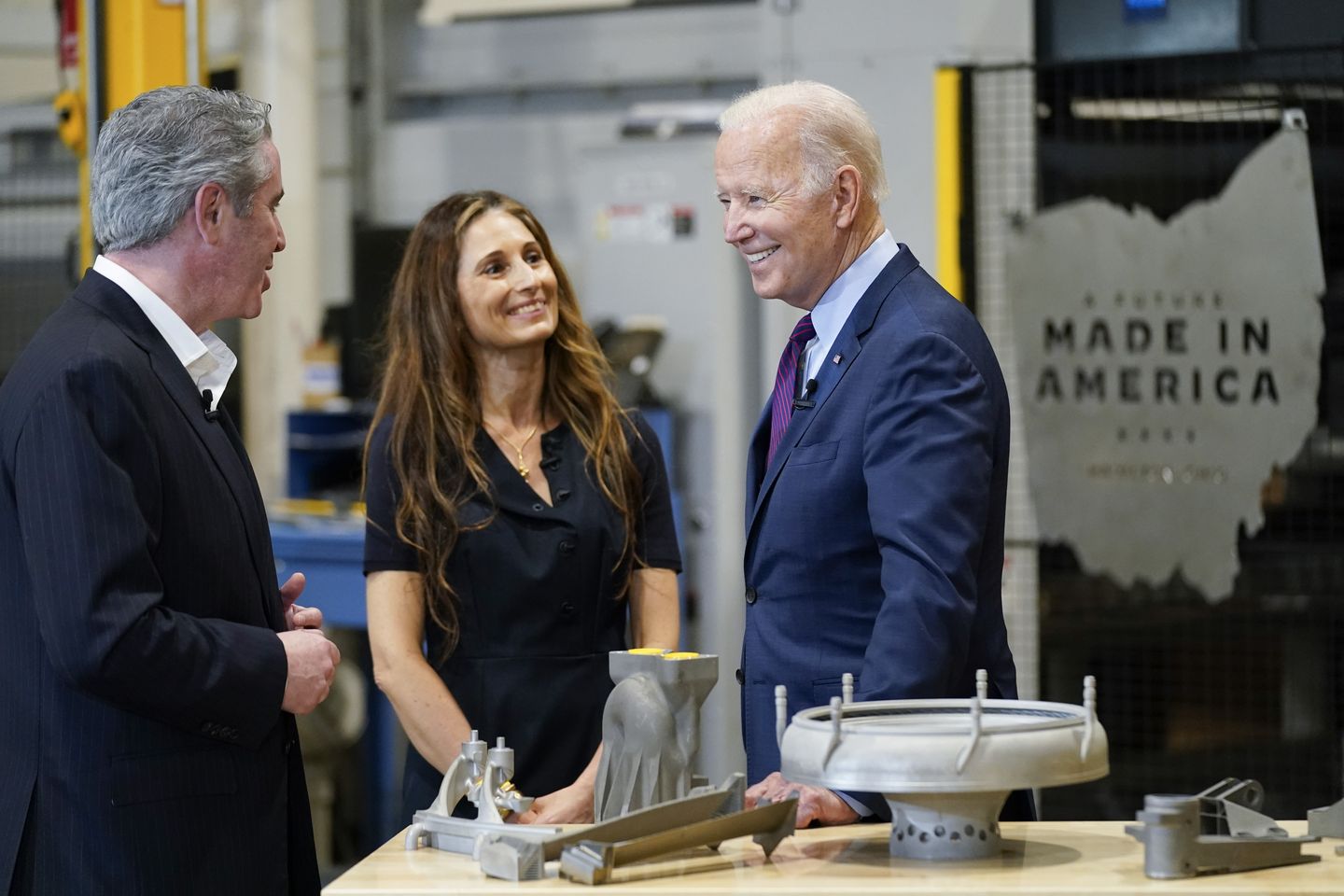 Biden plays up jobs gains but can't shake bigger economic woes