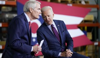 President Joe Biden speaks with Sen. Rob Portman, R-Ohio, at United Performance Metals in Hamilton, Ohio, Friday, May 6, 2022. (AP Photo/Andrew Harnik)