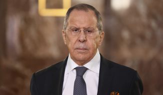 In this handout photo released by the Russian Foreign Ministry Press Service, Russian Foreign Minister Sergey Lavrov attends a wreath-laying ceremony, to remember Soviet diplomats killed during the World War II, on Friday, May 6, 2022. (Russian Foreign Ministry Press Service via AP) ** FILE **