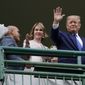 Former President Donald Trump waves to the crowd as he attends the 148th running of the Kentucky Derby horse race at Churchill Downs Saturday, May 7, 2022, in Louisville, Ky. (AP Photo/Mark Humphrey)