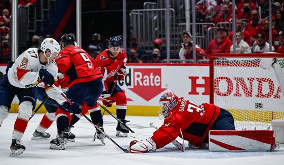 Washington Capitals Ilya Samsonov dives on a loose puck against the Florida Panthers during Game 3 of the Stanley Cup playoffs at Capital One Arena in Washington D.C., May 7, 2022. (Photo by Brian Murphy, All-Pro Reels)