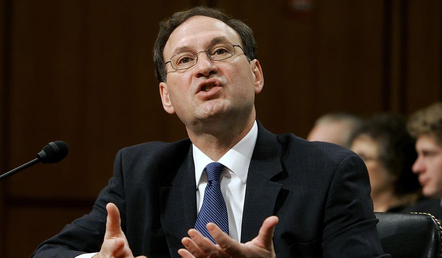 Supreme Court nominee Judge Samuel Alito answers a question on the third day of his confirmation hearings before the Senate Judiciary Committee on Capitol Hill in Washington, Jan. 11, 2006. In one form or another, every Supreme Court nominee is asked during Senate hearings about his or her views of the landmark abortion rights ruling that has stood for a half century. Now, a draft opinion obtained by Politico suggests that a majority of the court is prepared to strike down the Roe v. Wade decision from 1973, leaving it to the states to determine a woman’s ability to get an abortion. (AP Photo/Susan Walsh, File)