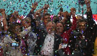 Confetti showers former Brazilian President Luiz Inacio Lula da Silva and supporters after the announcement of his candidacy for the country’s upcoming presidential election, in Sao Paulo, Brazil, Saturday, May 7, 2022. Brazil&#39;s general elections are scheduled for Oct. 2, 2022. (AP Photo/Andre Penner)