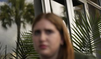Eden Hebron, 19, describes the years of work she has done to cope with trauma and mental health effects after witnessing a gunman kill a close friend and two other students in Florida&#39;s 2018 high school massacre in Parkland, during an interview with Associated Press journalists, Tuesday, March 8, 2022, in Hollywood, Fla. Hebron&#39;s experience shows how many of the survivors have grappled with severe mental health issues that derailed their adolescence and greatly impacted their families.(AP Photo/Rebecca Blackwell)
