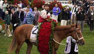 Sonny Leon rides Rich Strike in the winner&#39;s circle after winning the 148th running of the Kentucky Derby horse race at Churchill Downs Saturday, May 7, 2022, in Louisville, Ky. (AP Photo/Jeff Roberson) **FILE**