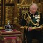 Prince Charles reads the Queen&#39;s Speech next to her crown during the State Opening of Parliament, at the Palace of Westminster in London, Tuesday, May 10, 2022. Queen Elizabeth II did not attend the opening of Parliament amid ongoing mobility issues. (AP Photo/Alastair Grant, Pool)