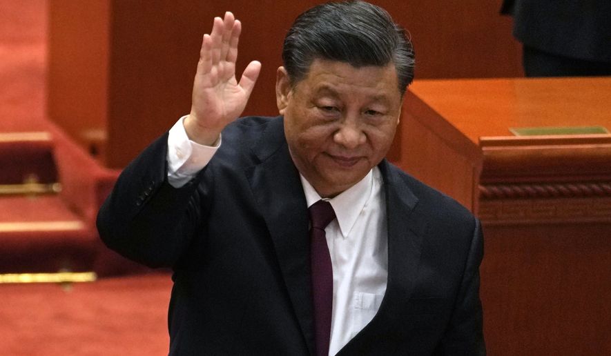 Chinese President Xi Jinping attends a commendation ceremony for role models of the Beijing Winter Olympics and Paralympics at the Great Hall of the People , Friday, April 8, 2022, in Beijing. Xi on Tuesday, May 10, 2022, promoted the role of the ruling Communist Party’s youth wing ahead of a key party congress later this year that comes amid rising economic and social pressures. (AP Photo/Ng Han Guan, File)