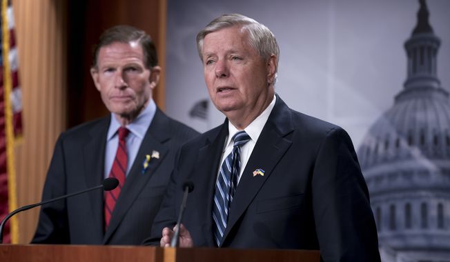 Sen. Richard Blumenthal, D-Conn., left, and Sen. Lindsey Graham, R-S.C., members of the Senate Judiciary Committee, speak to reporters about designating Russia as a state sponsor of terrorism because of Vladimir Putin&#x27;s invasion of Ukraine, at the Capitol in Washington, Tuesday, May 10, 2022. (AP Photo/J. Scott Applewhite)