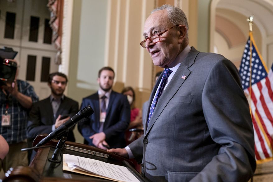 Senate Majority Leader Chuck Schumer, D-N.Y., speaks to reporters ahead of a procedural vote on Wednesday to essentially codify Roe v. Wade, at the Capitol in Washington, Tuesday, May 10, 2022. (AP Photo/J. Scott Applewhite)