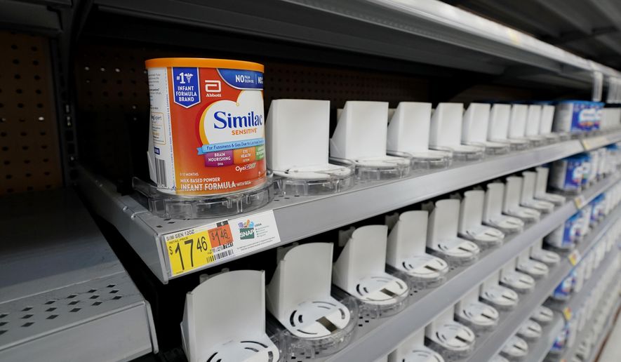 Shelves typically stocked with baby formula sit mostly empty at a store in San Antonio, Tuesday, May 10, 2022. Parents across the U.S. are scrambling to find baby formula because supply disruptions and a massive safety recall have swept many leading brands off store shelves. (AP Photo/Eric Gay)