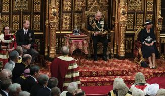 Prince Charles sits next to the Queen&#39;s crown during the State Opening of Parliament, at the Palace of Westminster in London, Tuesday, May 10, 2022. Queen Elizabeth II did not attend the opening of Parliament amid ongoing mobility issues. Prince William is seated second left, and Camilla Duchess of Cornwall is seated right. (AP Photo/Alastair Grant, Pool)