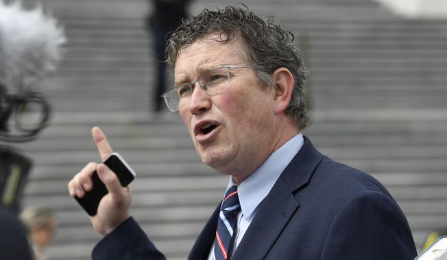 Rep. Thomas Massie, R-Ky., talks to reporters before leaving Capitol Hill in Washington, March 27, 2020. Massie is back in Donald Trump&#x27;s good graces. The Kentucky congressman won the former president&#x27;s endorsement Tuesday, May 10, 2022 ahead of next week&#x27;s primary election. Just two years ago, Trump said the maverick congressman should be thrown out of the Republican Party. Now the former president is calling Massie a 鈥淐onservative Warrior鈥� and a &amp;quot;first-rate Defender of the Constitution.鈥� (AP Photo/Susan Walsh, File)