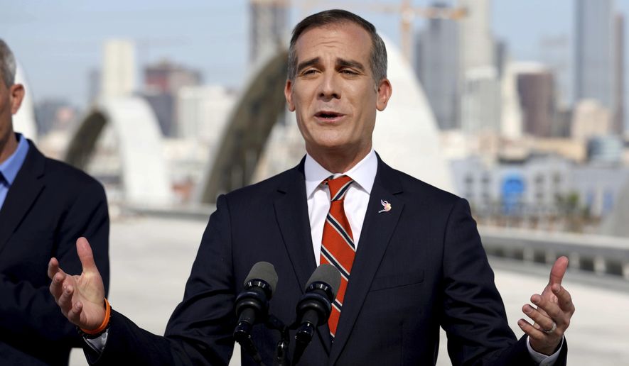 Los Angeles Mayor Eric Garcetti delivers State of the City Address from the under-construction Sixth Street Viaduct on Thursday, April 14, 2022, in Los Angeles. The top Republican on the U.S. Senate Judiciary Committee released an investigation Tuesday, May 10, 2022, that concluded that Mayor Garcetti "likely knew or should have known" that a former top adviser was allegedly sexually harassing city employees, a finding that contradicts the mayor's assertion that he was unaware of any inappropriate behavior. (Gary Coronado/Los Angeles Times via AP, Pool, File)