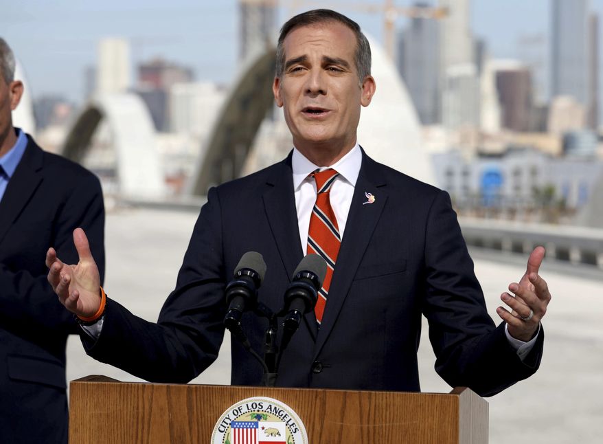 Los Angeles Mayor Eric Garcetti delivers State of the City Address from the under-construction Sixth Street Viaduct on Thursday, April 14, 2022, in Los Angeles. The top Republican on the U.S. Senate Judiciary Committee released an investigation Tuesday, May 10, 2022, that concluded that Mayor Garcetti "likely knew or should have known" that a former top adviser was allegedly sexually harassing city employees, a finding that contradicts the mayor's assertion that he was unaware of any inappropriate behavior. (Gary Coronado/Los Angeles Times via AP, Pool, File)