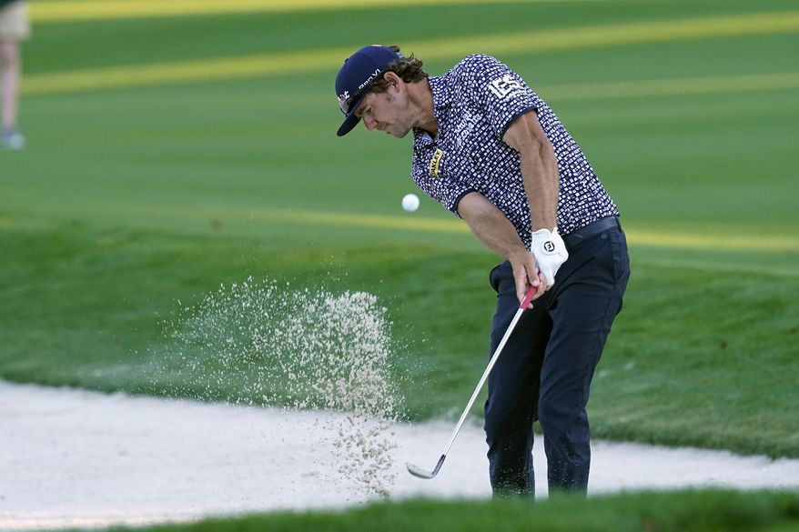 Lanto Griffin hits from a bunker on the 17th fairway during the first round of play in the Players Championship golf tournament, Thursday, March 10, 2022, in Ponte Vedra Beach, Fla. Griffin&#39;s final round Sunday, May 8, 2022, at the Wells Fargo Championship, assured him a spot in the PGA Championship next week. (AP Photo/Gerald Herbert, File) **FILE**