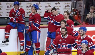 Montreal Canadiens goaltender Carey Price lines up with teammates for a ceremony following an NHL hockey game against the Florida Panther on Friday, April 29, 2022, in Montreal, on the closing night of the regular season. (Paul Chiasson/The Canadian Press via AP) **FILE**