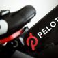 This Nov. 19, 2019 file photo shows the logo on a Peloton bike in San Francisco. Peloton&#39;s loss widened in its fiscal third quarter and sales continued to slow as the company contends with a further cooling of the exercise-at-home trend. Shares tumbled more than 25% before the market open on Tuesday, May 10, 2022. (AP Photo/Jeff Chiu, File)
