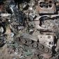Destroyed Russian military vehicles lie in a garbage dump in Bucha, on the outskirts of Kyiv, Ukraine, Tuesday, May 10, 2022. (AP Photo/Efrem Lukatsky)