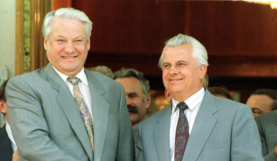 President Boris Yeltsin, left, shakes hands with Ukrainian President Leonid Kravchuk during his visit to Ukraine, Yalta, Aug. 3, 1992. Kravchuk, who led Ukraine to independence amid the collapse of the Soviet Union and served as its first president, has died, a Ukrainian official said Tuesday, May 10, 2022. He was 88. (AP Photo/Efrem Lukatsky, File)