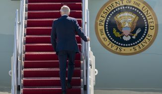 President Joe Biden boards Air Force One at Andrews Air Force Base, Md., Wednesday, May 11, 2022, en route to Chicago, and then on to Kankakee, Ill. (AP Photo/Gemunu Amarasinghe)