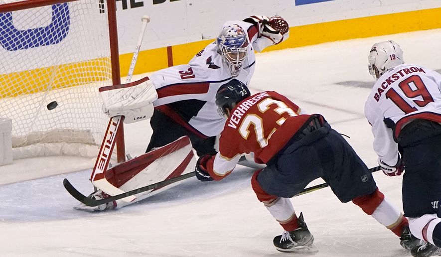Florida Panthers center Carter Verhaeghe (23) scores a goal against Washington Capitals goaltender Ilya Samsonov (30) during the third period of Game 5 of the first round of the NHL Stanley Cup hockey playoffs, Wednesday, May 11, 2022, in Sunrise, Fla. (AP Photo/Lynne Sladky) **FILE**