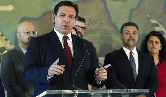 Florida Gov. Ron DeSantis speaks at Miami&#39;s Freedom Tower, on Monday, May 9, 2022, in Miami. A congressional map approved by DeSantis and drawn by his staff is unconstitutional because it breaks up a district where Black voters can choose their representatives, a state judge said Wednesday, May 11, 2022. (AP Photo/Marta Lavandier, File)