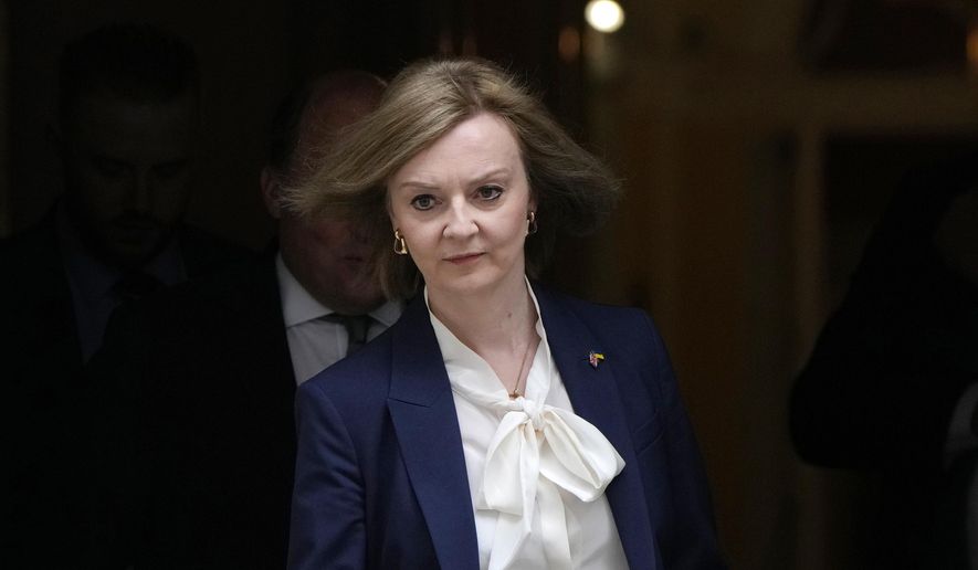 FILE - Elizabeth Truss, Britain&#39;s Foreign Secretary leaves a Cabinet meeting at 10 Downing Street in London, Tuesday, April 19, 2022. Britain and the European Union are once again at loggerheads over Brexit on Wednesday, May 11, 2022. The U.K. government has ramped up threats to scrap parts of its trade treaty with the bloc, saying the rules are preventing the formation of a new government in Northern Ireland.  (AP Photo/Alastair Grant, File)