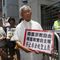 Hong Kong&#39;s outspoken Cardinal Joseph Zen, center, and other religious protesters hold placards with &quot;Respects religious freedom&quot; written on them during a demonstration outside the China Liaison Office in Hong Kong, Wednesday, July 11, 2012. Reports say a Roman Catholic cardinal and three others have been arrested in Hong Kong on suspicion of colluding with foreign forces to endanger Chinese national security. U.K.-based human rights group Hong Kong Watch said Cardinal Joseph Zen, lawyer Margaret Ng, singer Denise Ho and scholar Hui Po-keung were detained Wednesday, May 11, 2022, by Hong Kong&#39;s National Security Police. (AP Photo/Kin Cheung, File)
