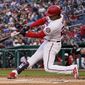 Washington Nationals&#39; Juan Soto hits a two-run homer during the first inning of a baseball game against the New York Mets at Nationals Park, Wednesday, May 11, 2022, in Washington. (AP Photo/Alex Brandon)