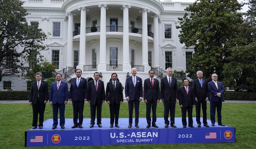 Leaders from the Association of Southeast Asian Nations (ASEAN) pose with President Joe Biden in a group photo on the South Lawn of the White House in Washington, Thursday, May 12, 2022. From left are, Secretary-General of the Association for Southeast Asian Nations Dato Lim Jock Hoi, Vietnamese Prime Minister Pham Minh Chinh, Thailand Prime Minister Prayut Chan-ocha, Cambodian Prime Minister Hun Sen, Sultan of Brunei Haji Hassanal Bolkiah, Biden, Indonesian President Joko Widodo, Singapore Prime Minister Lee Hsien Loong, Laos Prime Minister Phankham Viphavan, Malaysian Prime Minister Dato’ Sri Ismail Sabri bin Yaakob and Philippines Foreign Affairs Secretary Teodoro Locsin Jr. (AP Photo/Susan Walsh)