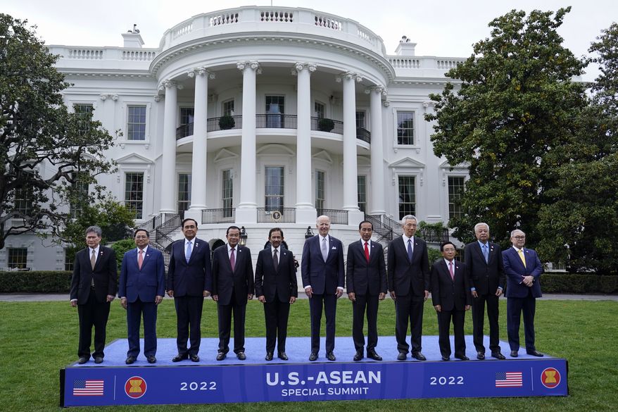 Leaders from the Association of Southeast Asian Nations (ASEAN) pose with President Joe Biden in a group photo on the South Lawn of the White House in Washington, Thursday, May 12, 2022. From left are, Secretary-General of the Association for Southeast Asian Nations Dato Lim Jock Hoi, Vietnamese Prime Minister Pham Minh Chinh, Thailand Prime Minister Prayut Chan-ocha, Cambodian Prime Minister Hun Sen, Sultan of Brunei Haji Hassanal Bolkiah, Biden, Indonesian President Joko Widodo, Singapore Prime Minister Lee Hsien Loong, Laos Prime Minister Phankham Viphavan, Malaysian Prime Minister Dato’ Sri Ismail Sabri bin Yaakob and Philippines Foreign Affairs Secretary Teodoro Locsin Jr. (AP Photo/Susan Walsh)