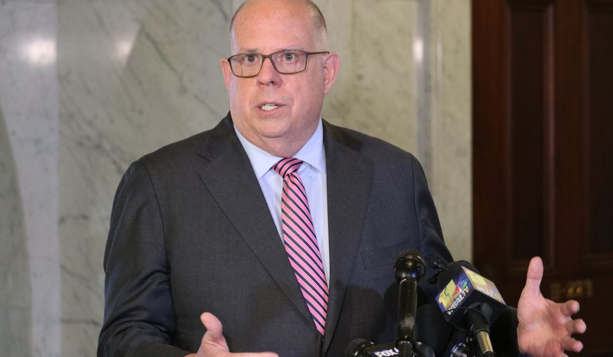 Maryland Gov. Larry Hogan talks to reporters, April, 4, 2022. Hogan signed measures to strengthen cybersecurity in state and local governments in Maryland on Thursday, May 12, after lawmakers approved legislation and big investments this year to protect vital systems against cyberattacks. (AP Photo/Brian Witte, File)