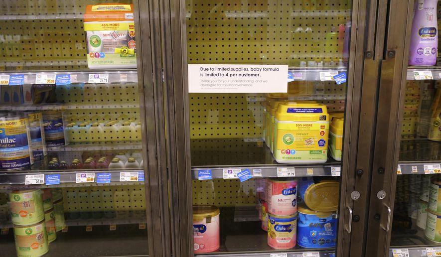 A due to limited supplies sign is shown on the baby formula shelf at a grocery store Tuesday, May 10, 2022, in Salt Lake City. Parents across much of the U.S. are scrambling to find baby formula after a combination of supply disruptions and safety recalls have swept many of the leading brands off store shelves. (AP Photo/Rick Bowmer)