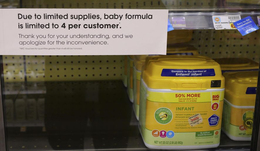 A due to limited supplies sign is displayed on the baby formula shelf at a grocery store Tuesday, May 10, 2022, in Salt Lake City. Parents across much of the U.S. are scrambling to find baby formula after a combination of supply disruptions and safety recalls have swept many of the leading brands off store shelves. The GOP Doctors Caucus is pointing blame at the Biden administration for the shortage, which has prompted a scare and frustration among new parents across the country. (AP Photo/Rick Bowmer)