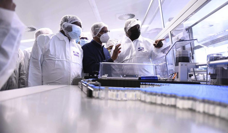 FILE — South African President Cyril Ramaphosa, right, heads a government delegation on a visit to ASPEN Pharmaceuticals in Port Elizabeth, South Africa March 29, 2021. The first factory to produce COVID-19 vaccines in Africa has announced on Thursday, Mar 12, 2022 that it has not received adequate orders and is planning to stop production within a few weeks, in what a senior World Health Organization official described as a &amp;quot;failure&amp;quot; in efforts to achieve vaccine equity. (AP Photo,file)