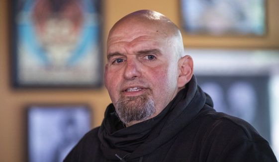 Lt. John Fetterman speaks to supporters at the Holy Hound Tap Room in downtown York, Pa., on Thursday, May 12, 2022, while campaigning for U.S. Senate seat. (Mark Pynes/The Patriot-News via AP)