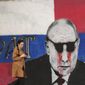A woman passes by a mural depicting the Russian President Vladimir Putin that reads: &#x27;&#x27;Brother&#x27;&#x27; vandalized with paint, in Belgrade, Serbia, Saturday, May 7, 2022. Despite having to pay a big price Serbia for not introducing sanctions to Russia, Serbia will not do it , Serbian President Vucic said, but despite that the country will stay on its path toward the EU. (AP Photo/Darko Vojinovic)