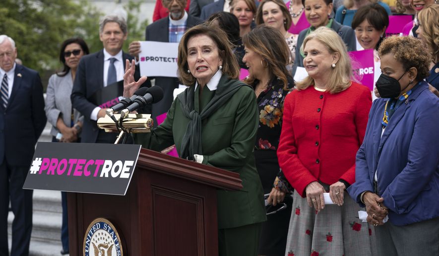 Speaker of the House Nancy Pelosi, D-Calif., leads an event with House Democrats after the Senate failed to pass the Women&#39;s Health Protection Act to ensure a federally protected right to abortion access, on the Capitol steps in Washington, Friday, May 13, 2022. (AP Photo/J. Scott Applewhite)