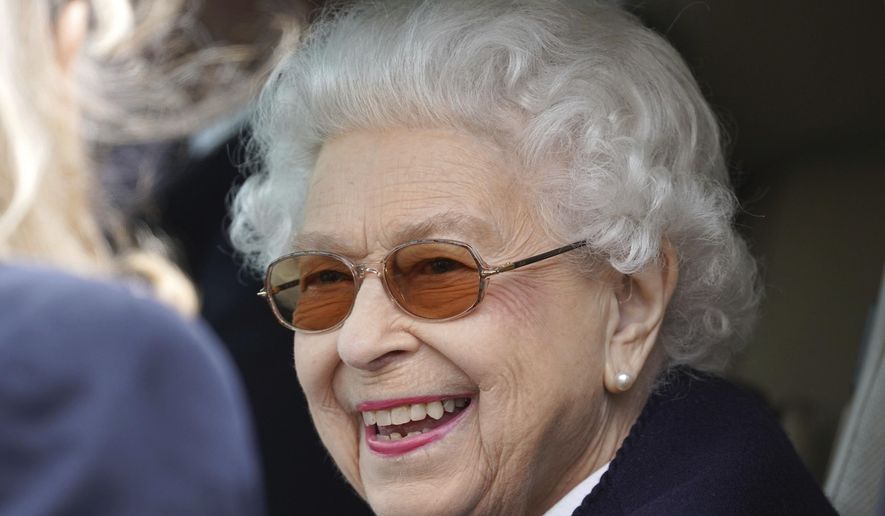 Britain&#x27;s Queen Elizabeth II smiles as she attends at the Royal Windsor Horse Show, Windsor, England, Friday May 13, 2022. The Queen&#x27;s appearance at the Royal Windsor Horse Show came a few days after she delegated the opening of Parliament to Prince Charles. (Steve Parsons/PA via AP)