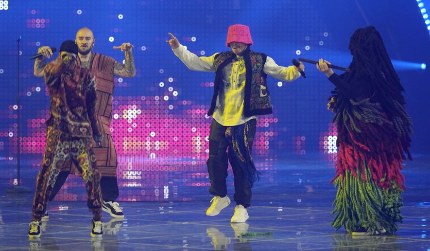 Kalush Orchestra from Ukraine singing 'Stefania' performs during the final dress rehearsal at the Eurovision Song Contest in Turin, Italy, Friday, May 13, 2022. (AP Photo/Luca Bruno)