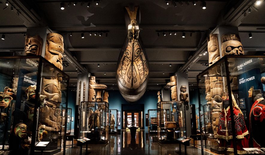 Artifacts, dioramas, and representations of Native American culture from the northwest coast of North America are displayed, Tuesday, May 10, 2022, at the American Museum of Natural History in New York. The oldest gallery at the American Museum of Natural History, the Northwest Coast Hall, is reopening to the public Friday after an extensive 5-year, $19 million renovation based on input from representatives of all the Indigenous tribes whose cultures are on display. (AP Photo/John Minchillo)