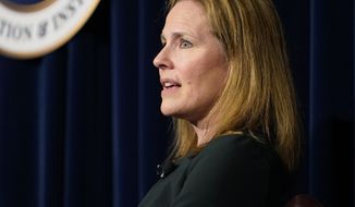 U.S. Supreme Court Associate Justice Amy Coney Barrett speaks at the Ronald Reagan Presidential Library Foundation in Simi Valley, Calif., Monday, April 4, 2022.   On Friday, May 13, The Associated Press reported on stories circulating online incorrectly claiming Barrett cited a need for a “domestic supply of infants” in a leaked draft opinion for a decision that would overturn Roe v. Wade. (AP Photo/Damian Dovarganes, File)