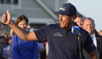 FILE - Phil Mickelson speaks after winning the PGA Championship golf tournament on the Ocean Course, May 23, 2021, in Kiawah Island, S.C. Mickelson has not been heard from in three months. It is uncertain if he will defend his title at Southern Hills on May 19-22. (AP Photo/David J. Phillip, File)