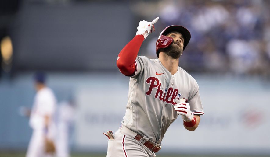 Philadelphia Phillies&#x27; Bryce Harper celebrates his solo home run against the Los Angeles Dodgers during the first inning of a baseball game in Los Angeles, Thursday, May 12, 2022. (AP Photo/Kyusung Gong) **FILE**