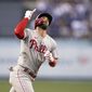 Philadelphia Phillies&#39; Bryce Harper celebrates his solo home run against the Los Angeles Dodgers during the first inning of a baseball game in Los Angeles, Thursday, May 12, 2022. (AP Photo/Kyusung Gong) **FILE**